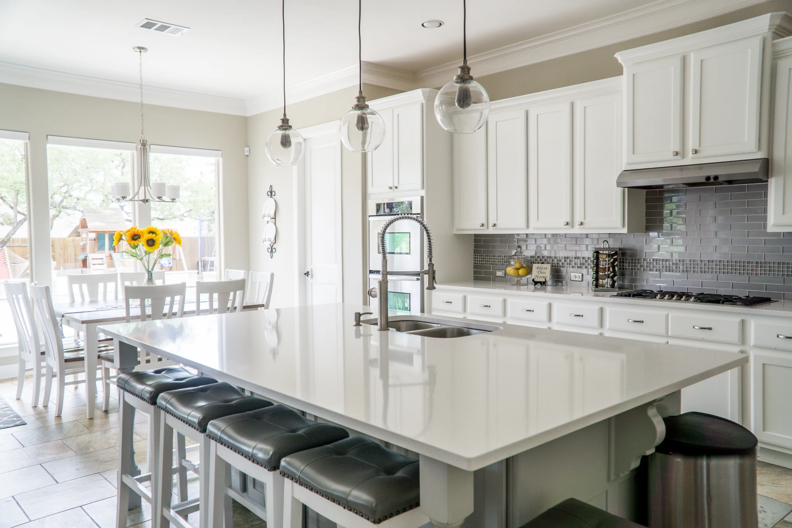 Modern kitchen featuring center island and dining space